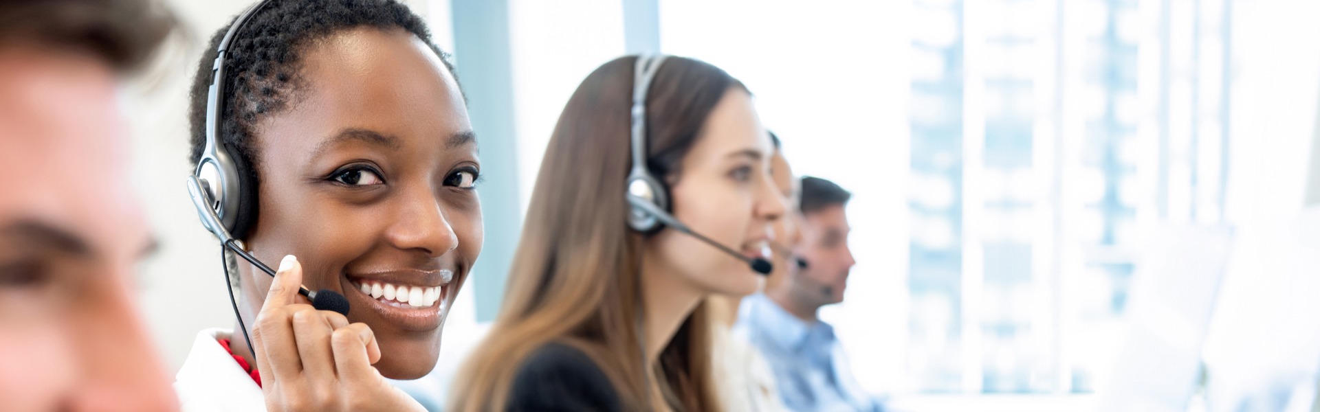 smiling female phone operator picture